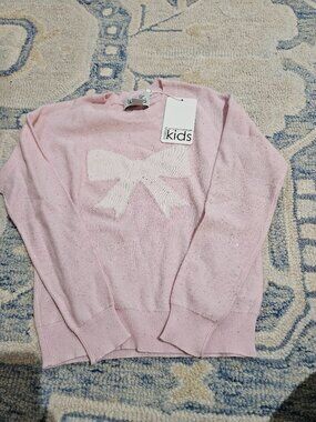 Soft pink knit bow sparkle sweater